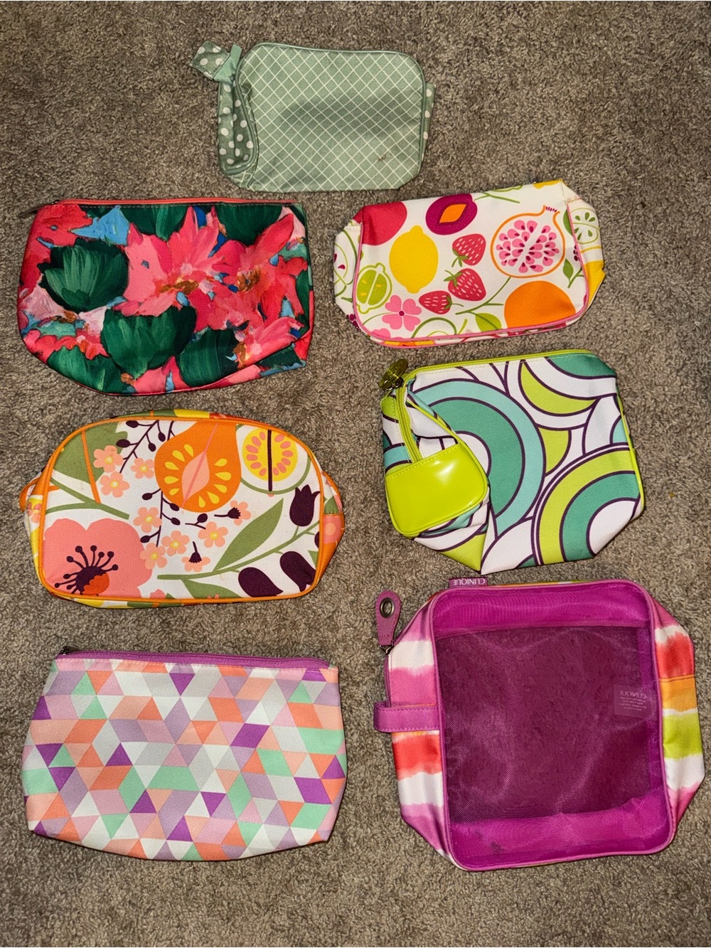 Clinique makeup bags lot of 8(one bag isn’t shown in first picture it’s the last